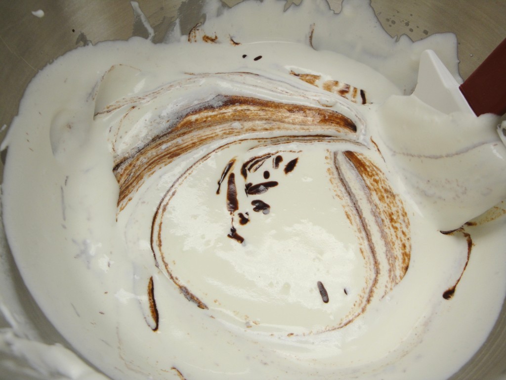 folding whipped cream into chocolate